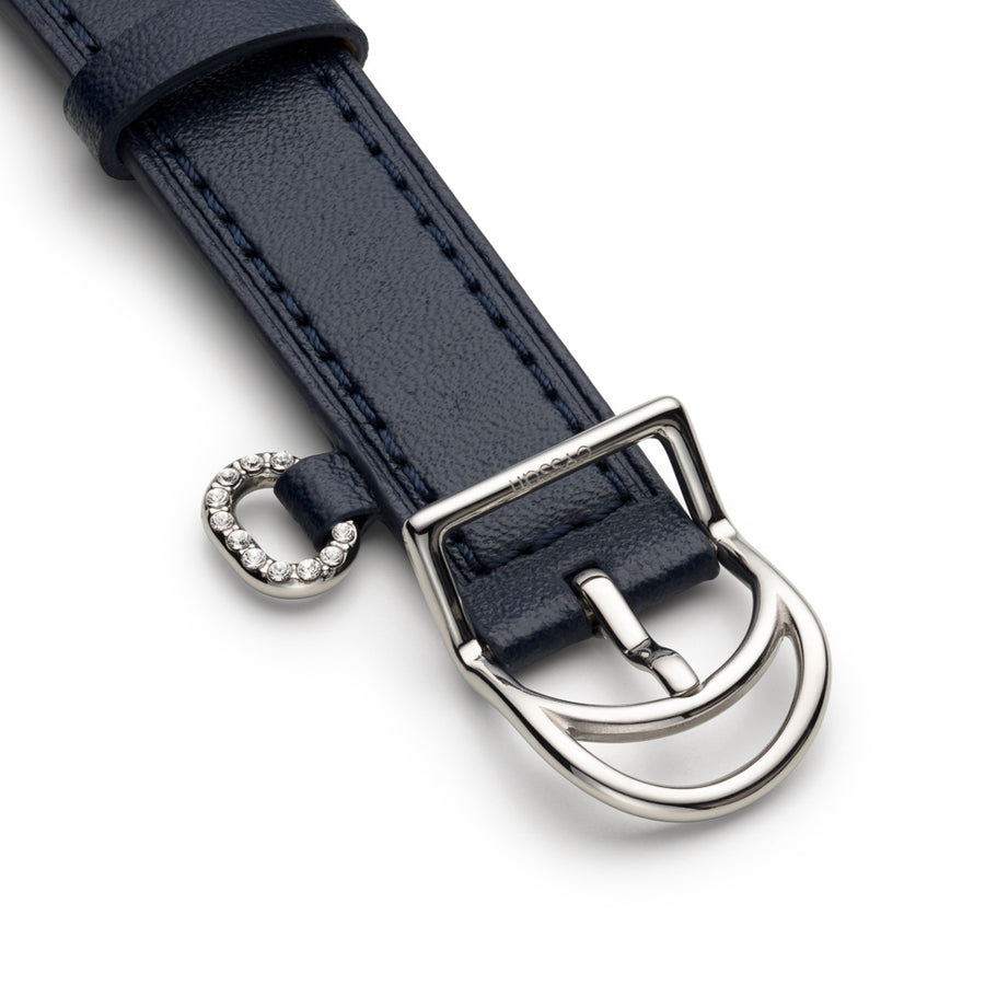 drak blue vegan-leather strap, silver buckle, and embellished strap detail.