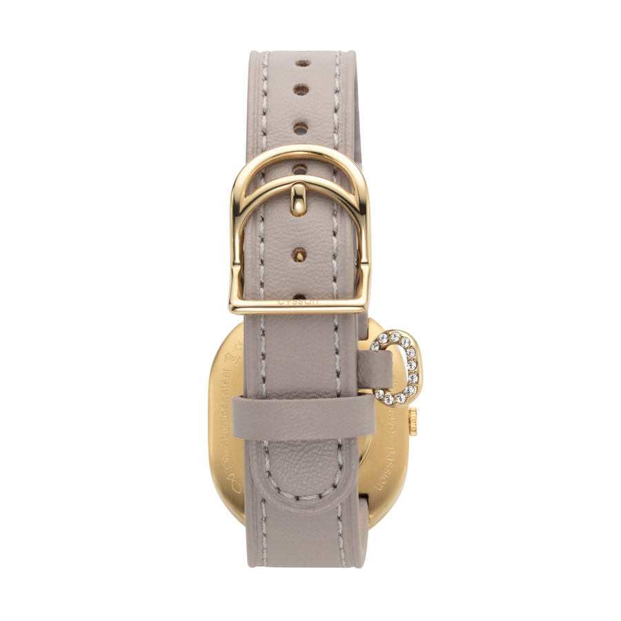 Back view of the cyssan watch showing the unique curved gold-plated buckle and embellished, sand-coloured  strap detail.