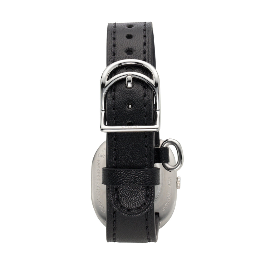 back view of a watch with a black strap and a curved, shiny stainless-steel buckle 