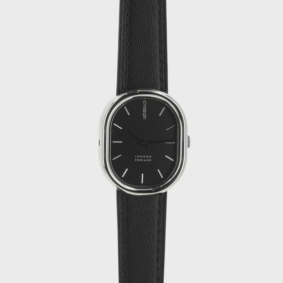A 360 video of the Cyssan watch, showing the silver case, hands and indexes, the black dial, the engraved crown and the caseback engraving. 